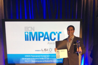 Alex Karapetian, Director of Sales and Marketing at Acopian Power Supplies, accepts the 2014 ECN Impact Award