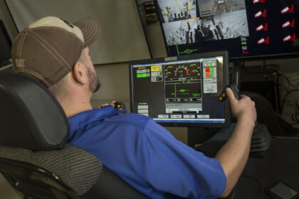 Command for dozing operator station at Caterpillar Proving Grounds