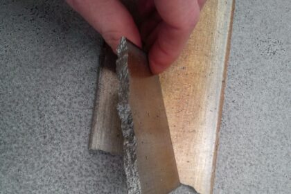 Discolouring provides visible signs of carbon material degrading; in this example the blade has turned dark grey showing degradation. The blade will eventually fail due to wear from particles inside the pump
