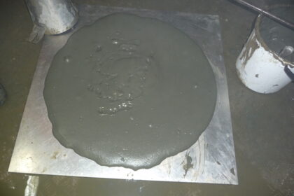 Chemical effects on the paste. Left: Control, 330mm Right: With Admixture, 660mm