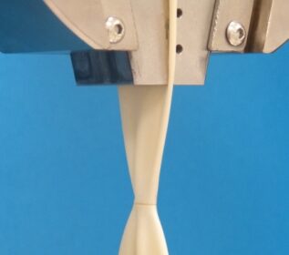 Panacol - Two rubber substrates bonded with new UV adhesive Vitralit VBB 2N LV show very high bond strength-comp