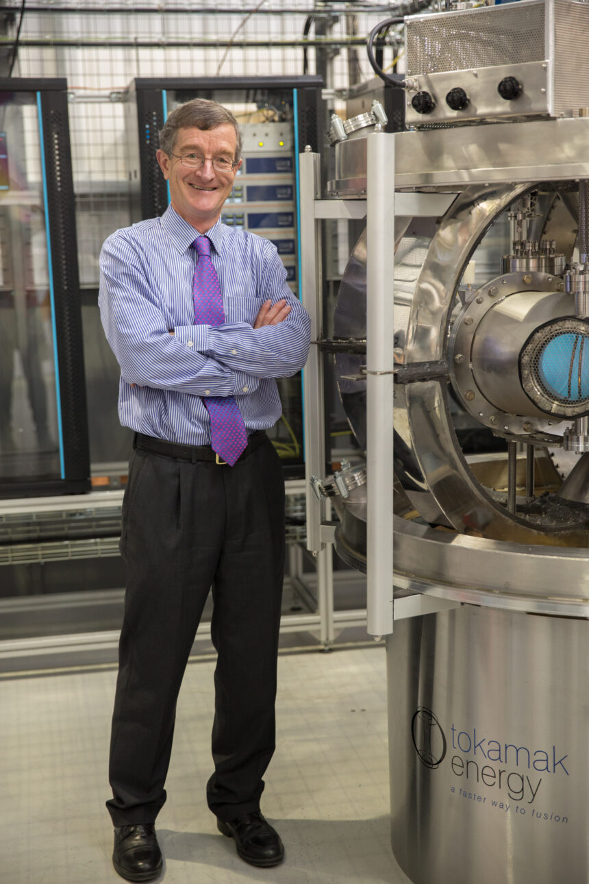 Dr David Kingham standing next to the ST25 HTS reactor