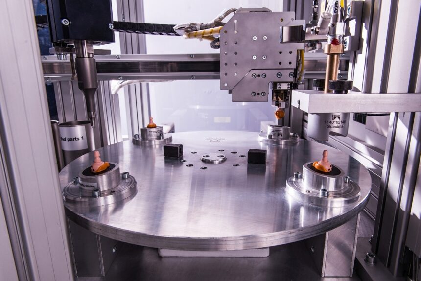 After they have been welded, the heads are automatically conveyed to the testing stations