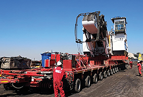Loading the machine onto the trailer