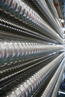 Corrugated tube heat exchangers