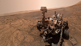 The Curiosity rover working on Mars