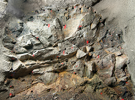 A tunnel front with blasting holes