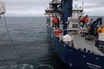 A photo of the cable charging a boat at sea