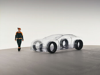 A Sandvik engineer walks around the eNimon, image via Sandvik